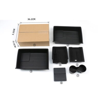 A collection of black custom-fit storage solutions for Tesla Model 3/Y including a drawer, compartments, and a coin holder, with dimensions labeled, for an organized and tidy vehicle interior