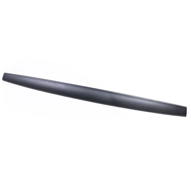 Sleek carbon fiber console trim overlay for Tesla Model 3/Y, enhancing vehicle interior aesthetics with a premium touch