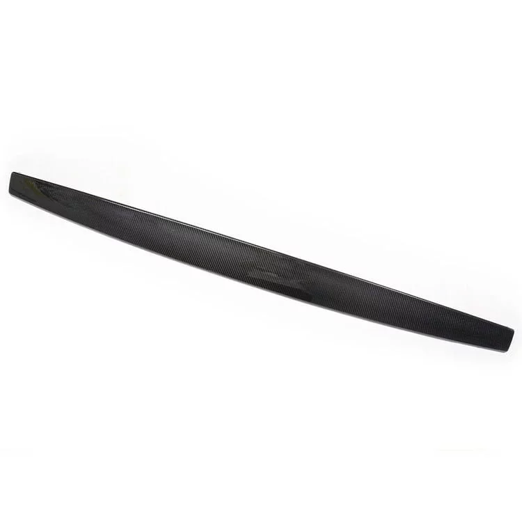 Curved carbon fiber dashboard trim accessory for Tesla Model 3/Y, featuring a smooth, sleek design for interior enhancement
