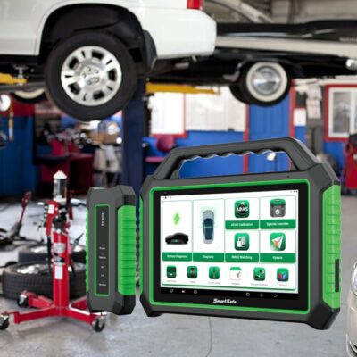 EV diagnostic scanner P01 in a professional garage setup with a car raised on a lift in the background