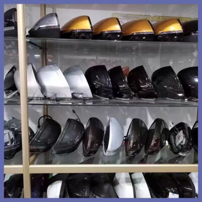 Display of Lixiang car rearview mirrors in multiple colors and finishes on a shelf